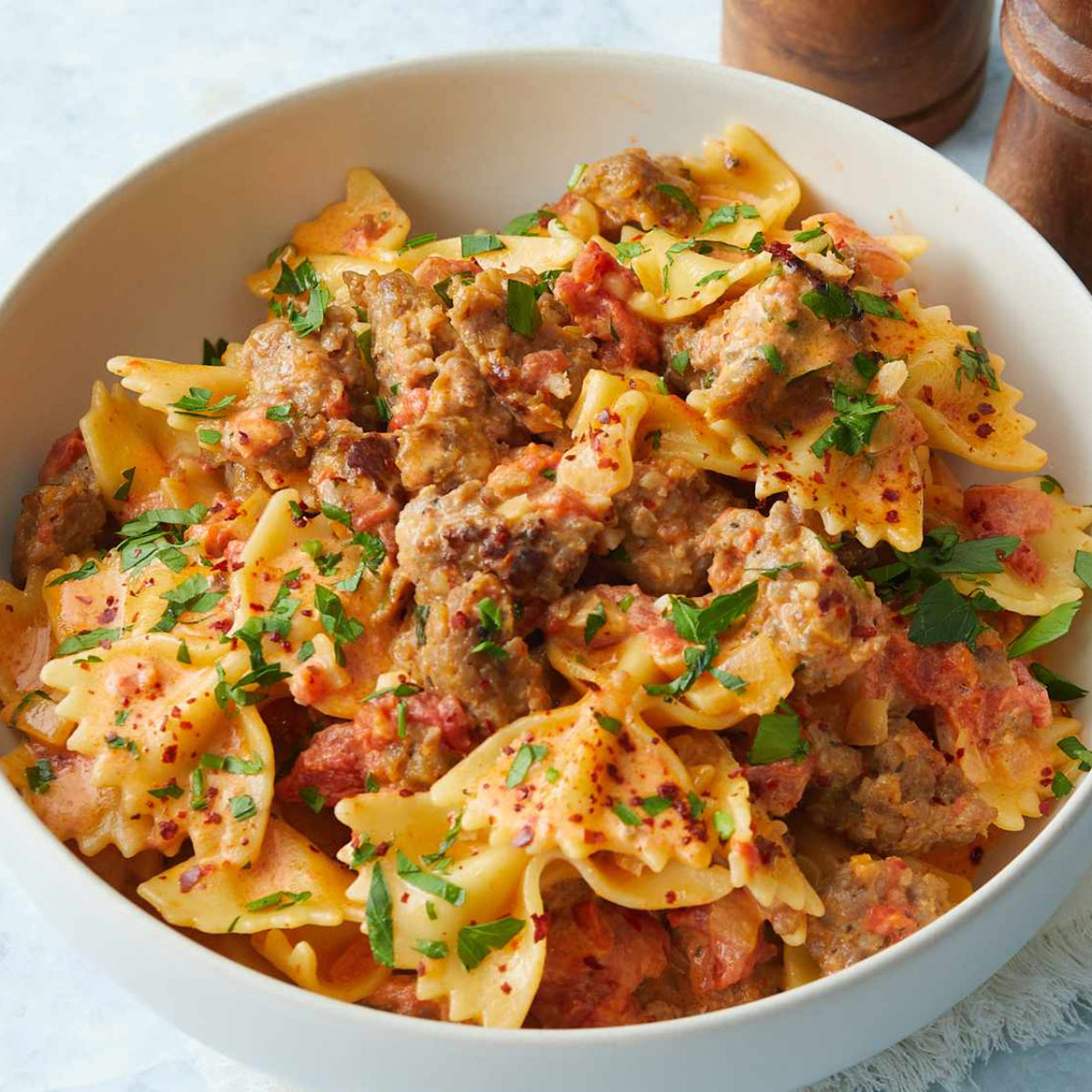 Italian Sausage & Peppers over Bow Tie Pasta