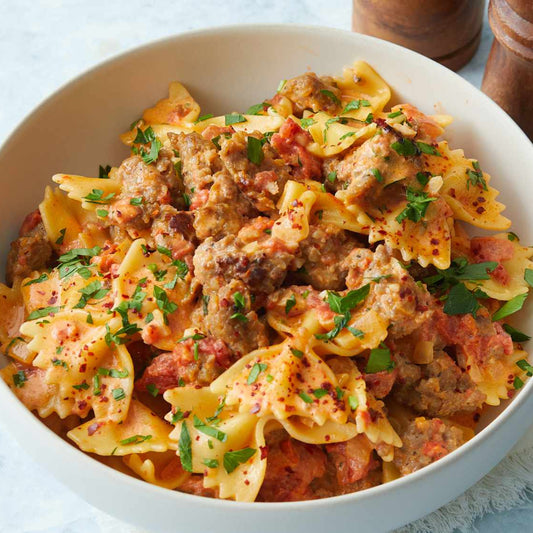 Italian Sausage & Peppers over Bow Tie Pasta